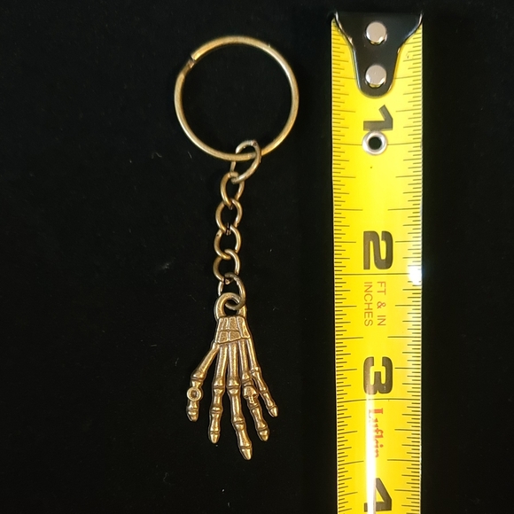 Brass Alloy Skeleton Hand With Skelton Ring Key Chain - Picture 4 of 4